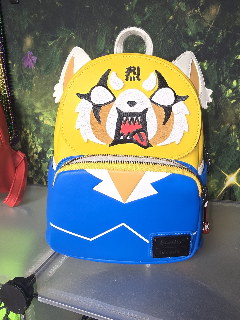 Sanrio Aggretsuko Two-Face Cosplay Mini Backpack by Loungefly